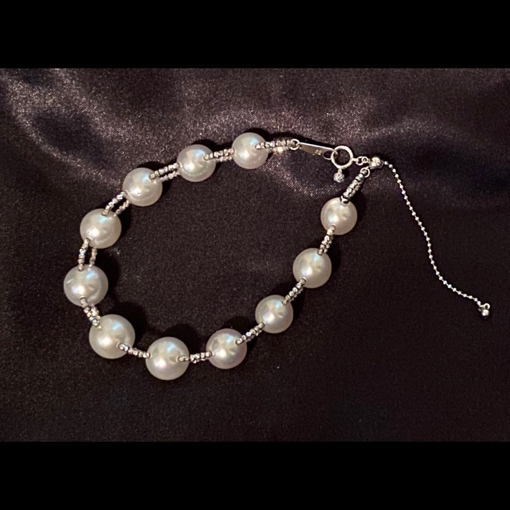 18k white gold bracelet with 11 south sea pearls